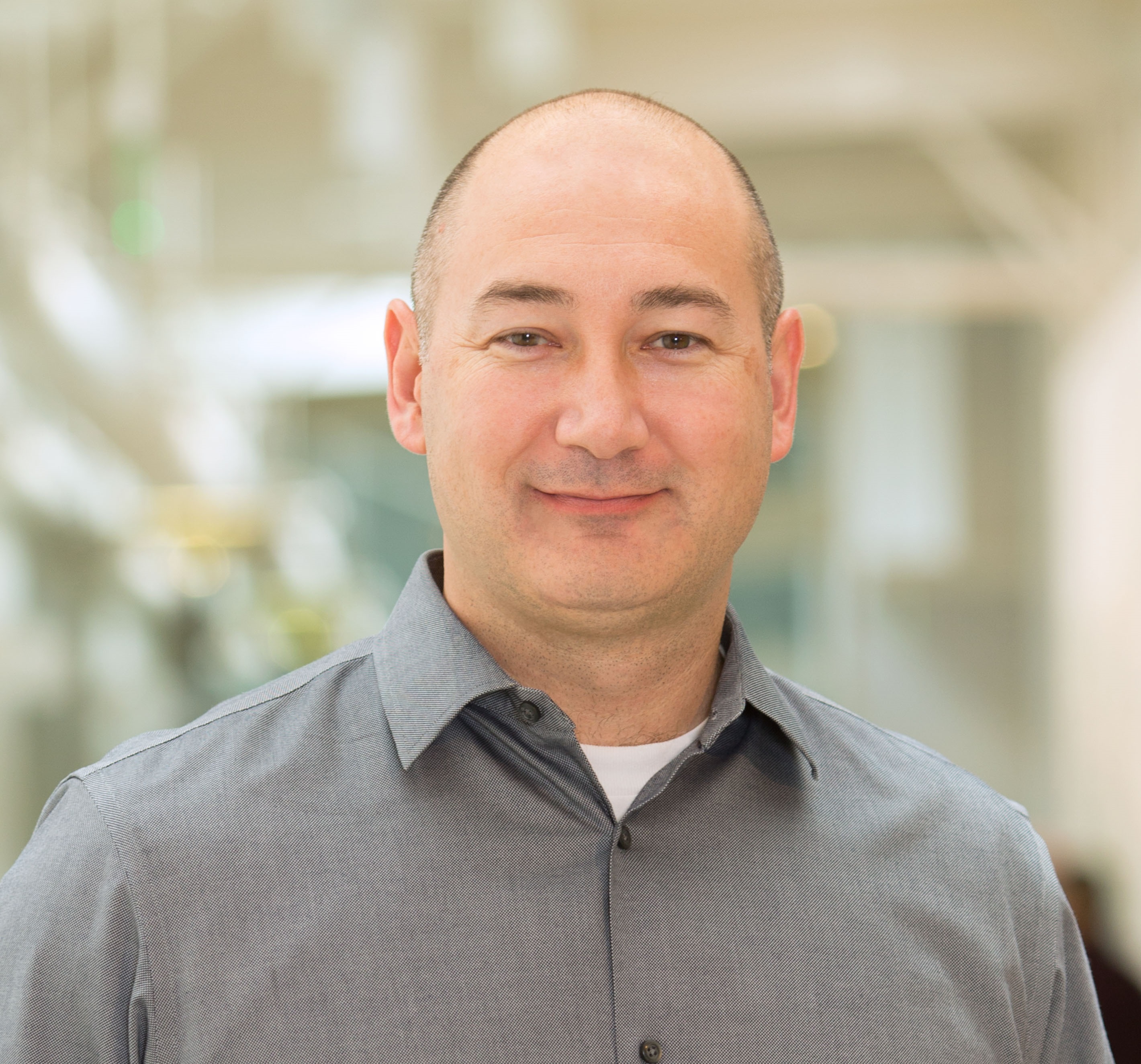 CHRISTOPHER AGUON, VP OF REAL ESTATE